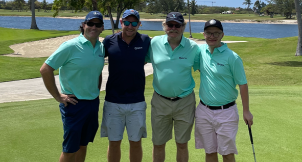 GCM team members golfing